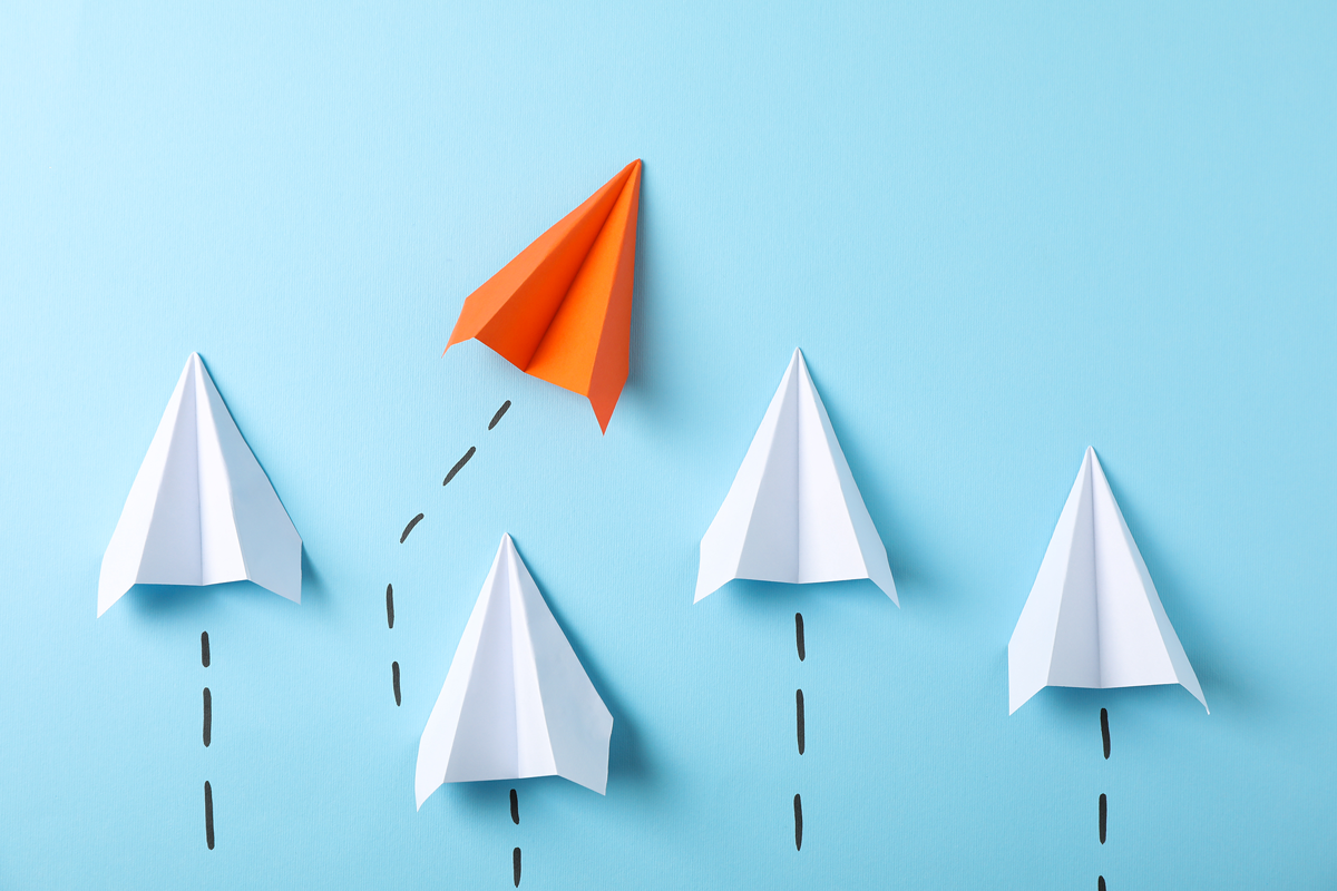 paper-airplanes-on-blue-background-space-for-text-2022-02-03-03-56-11-utc